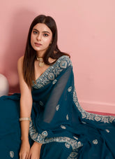 Captivating Saree in teal blue colour